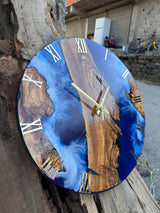Large ocean resin wall clock on a white wall as a coastal decor centrepiece