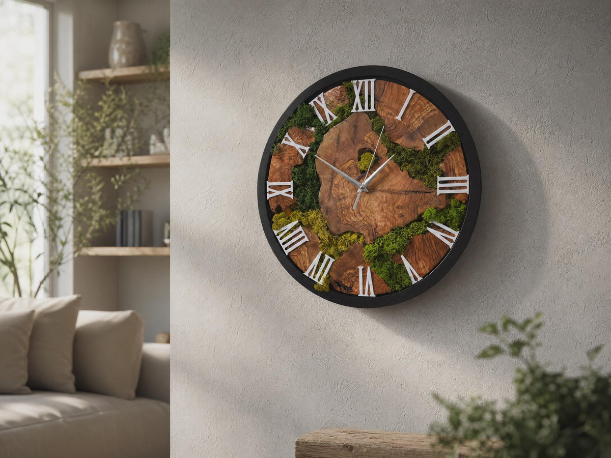 Round preserved moss and olive wood wall clock with black frame, white Roman numerals and silver hands