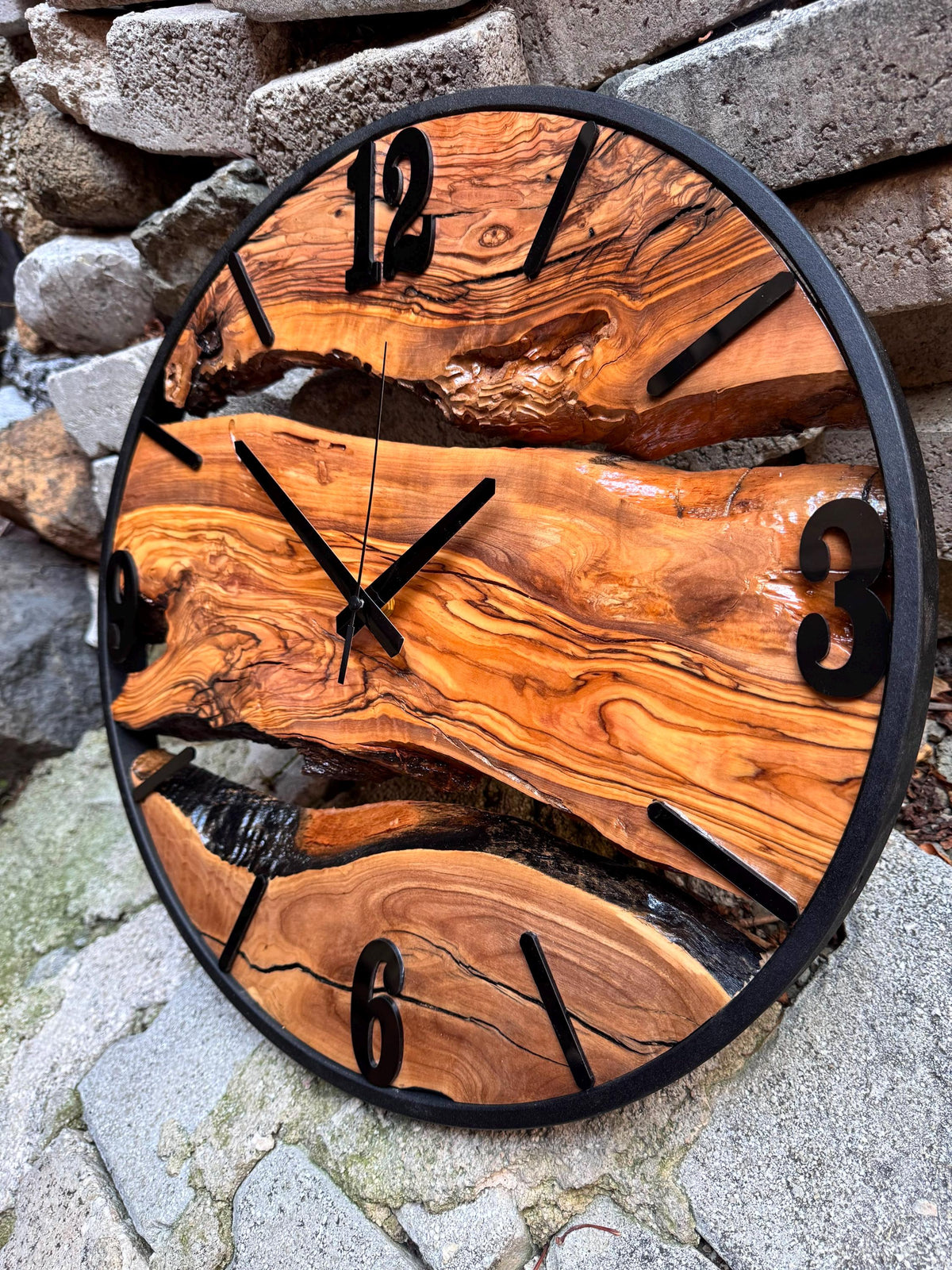 Care and hanging instructions for the large handmade olive wood wall timepiece