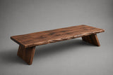 Low cedar coffee table styled with minimalist Japandi decor on a hardwood floor