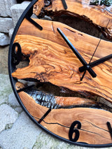 Live edge wood clock styled in a rustic dining room