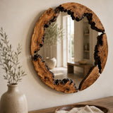 Olive wood mirror in a bathroom with linen towels