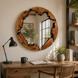 Overhead view of the round mirror on a white surface