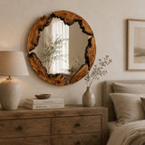 Mirror in a living room above a linen sofa