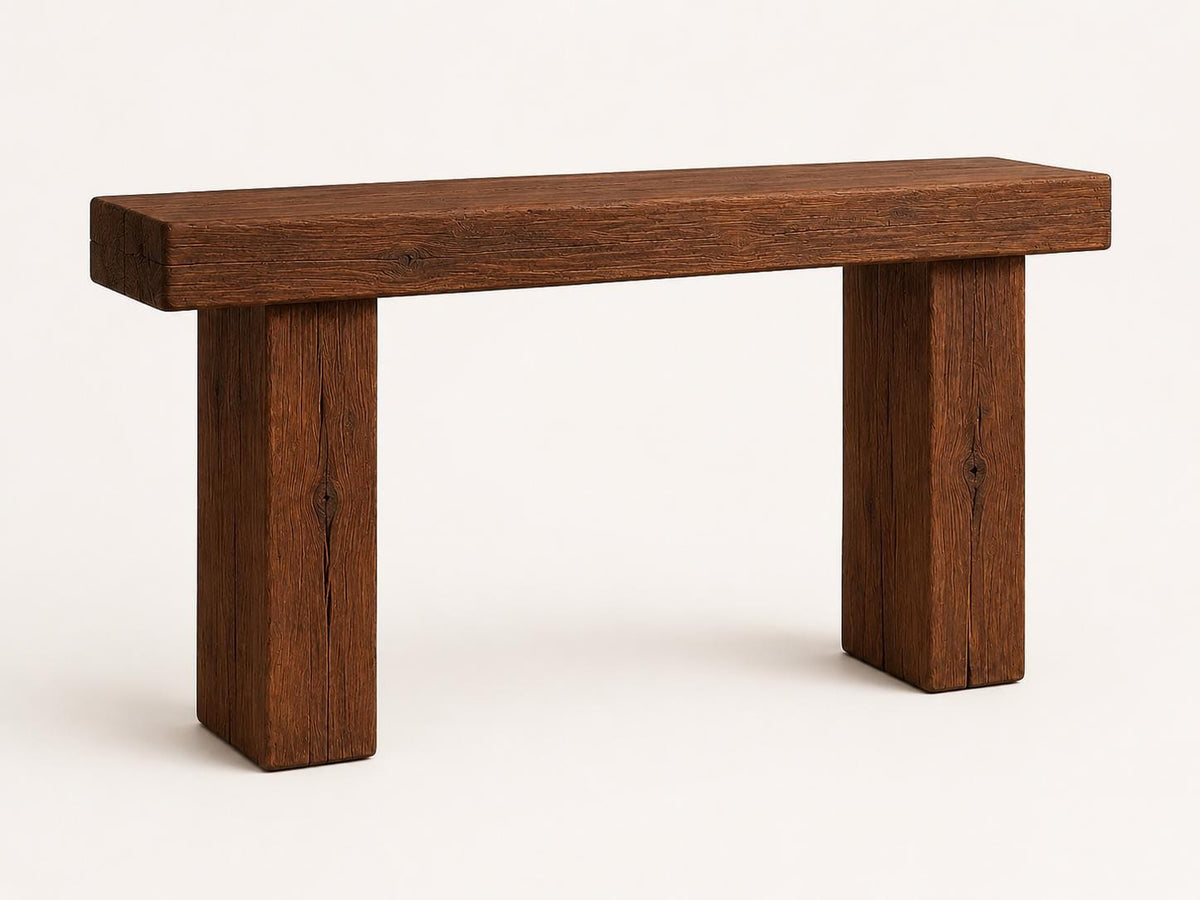 Slim rustic console table used as a sofa table behind a couch