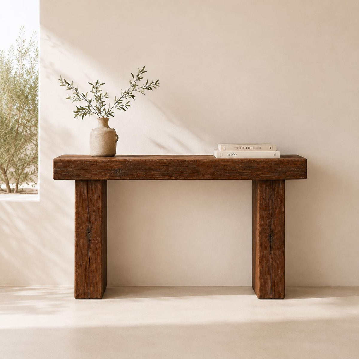 Handmade rustic entryway table with chunky wood top and minimalist base, front view