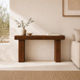 Scale reference photo showing the console table height next to a person