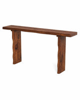 Narrow hallway console table against a white wall