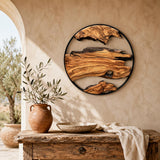 Round live-edge olive wood wall decor with natural grain pattern