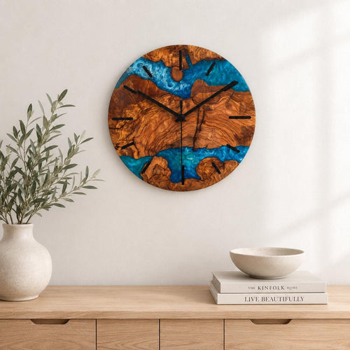Round live edge olive wood and blue epoxy wall clock