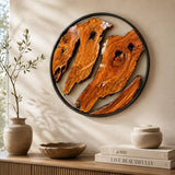 Olive wood wall art with circular black metal frame above a minimalist sofa