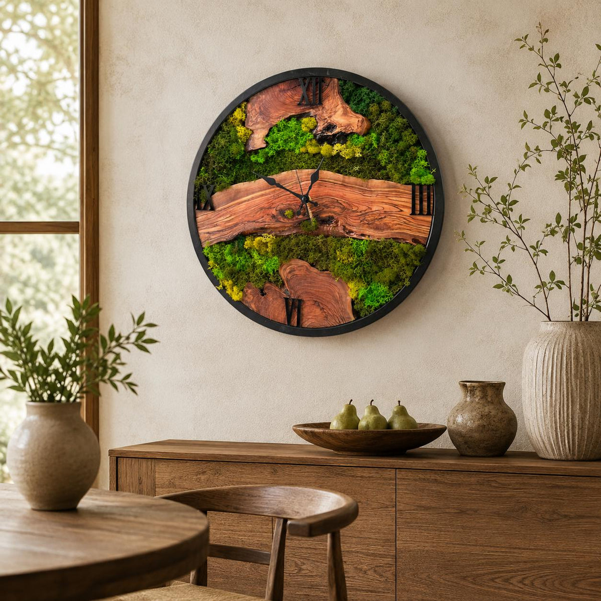 Overhead flat lay of the large olive wood moss wall clock on a neutral linen background