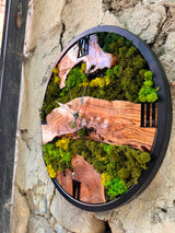 Moss wall clock shown at an angle