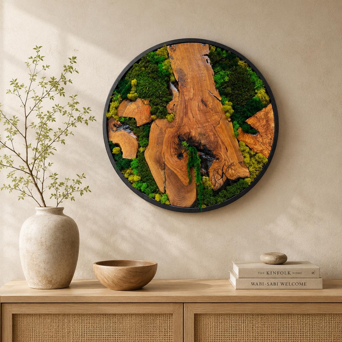 Circular moss wall art with a rich olive wood border and lush preserved moss centre