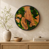 Circular moss wall art with a rich olive wood border and lush preserved moss centre