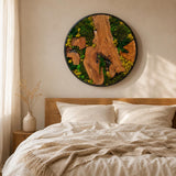 Circular moss wall piece hung in a modern living room as an organic green accent