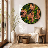 Biophilic moss wall clock in a modern living room above a neutral linen sofa