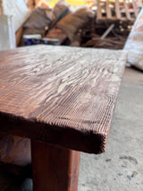 Side view showing the lower shelf and chunky legs