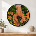 Round moss wall art against a white wall showing the full circular silhouette and olive wood live edge border