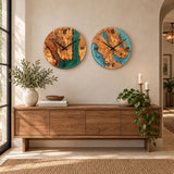 Green and turquoise epoxy olive wood wall clocks side by side above a rustic console