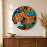 Coastal resin wall clock shown in a room setting