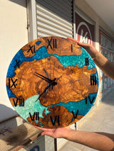 Blue resin and olive wood wall clock with black Roman numerals