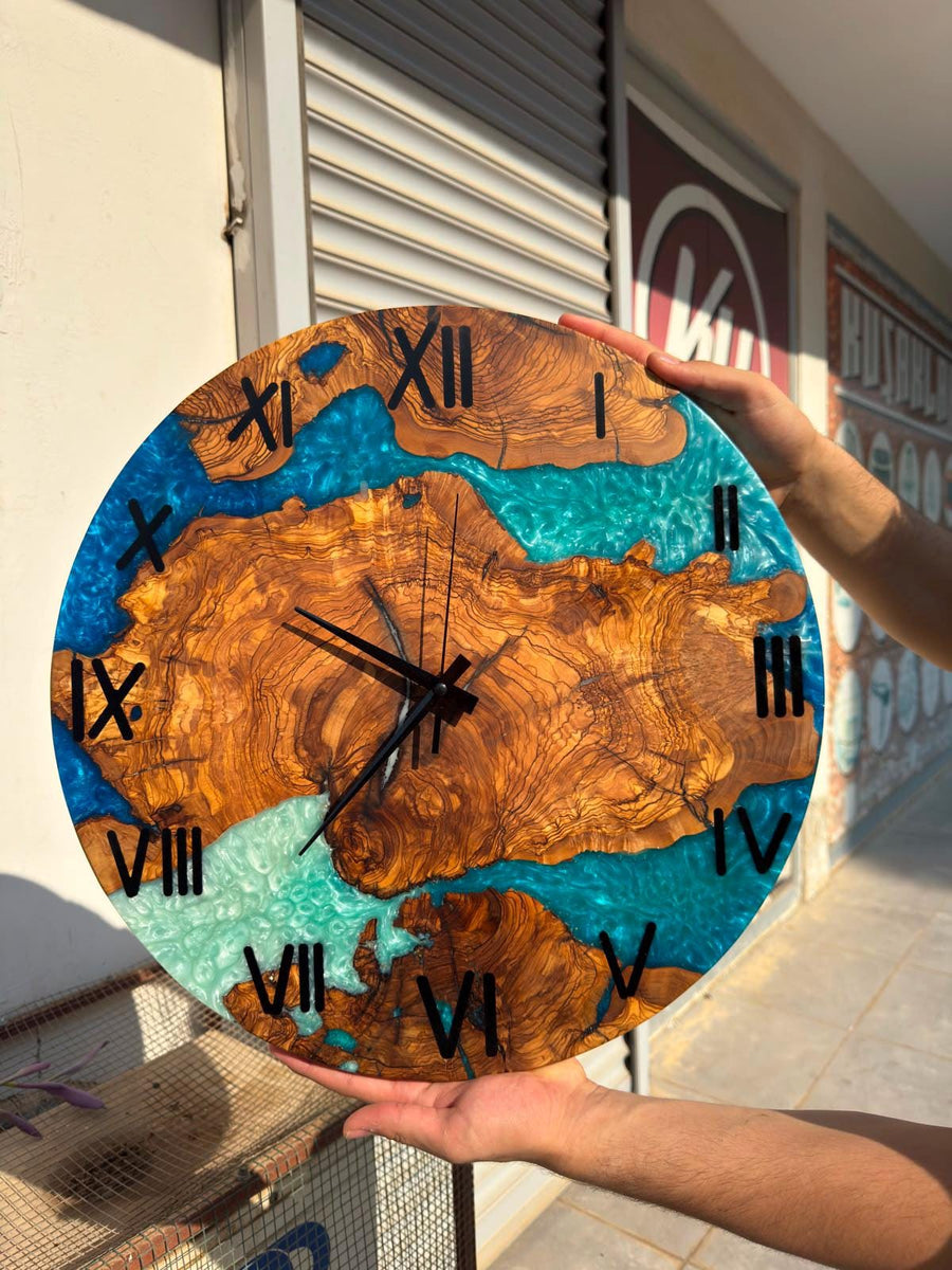 Blue resin and olive wood wall clock with black Roman numerals