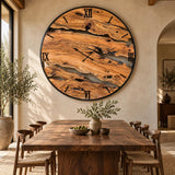 Oversized wooden wall clock showing warm olive tones, black metal frame and statement scale