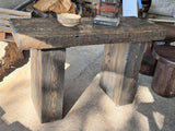 Close view of the reclaimed wood showing knots, grain and natural character