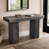 Handmade reclaimed wood sofa table behind a couch in a warm Japandi living room