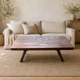 Straight front view of the rustic solid wood coffee table with a low profile and angled cedar legs