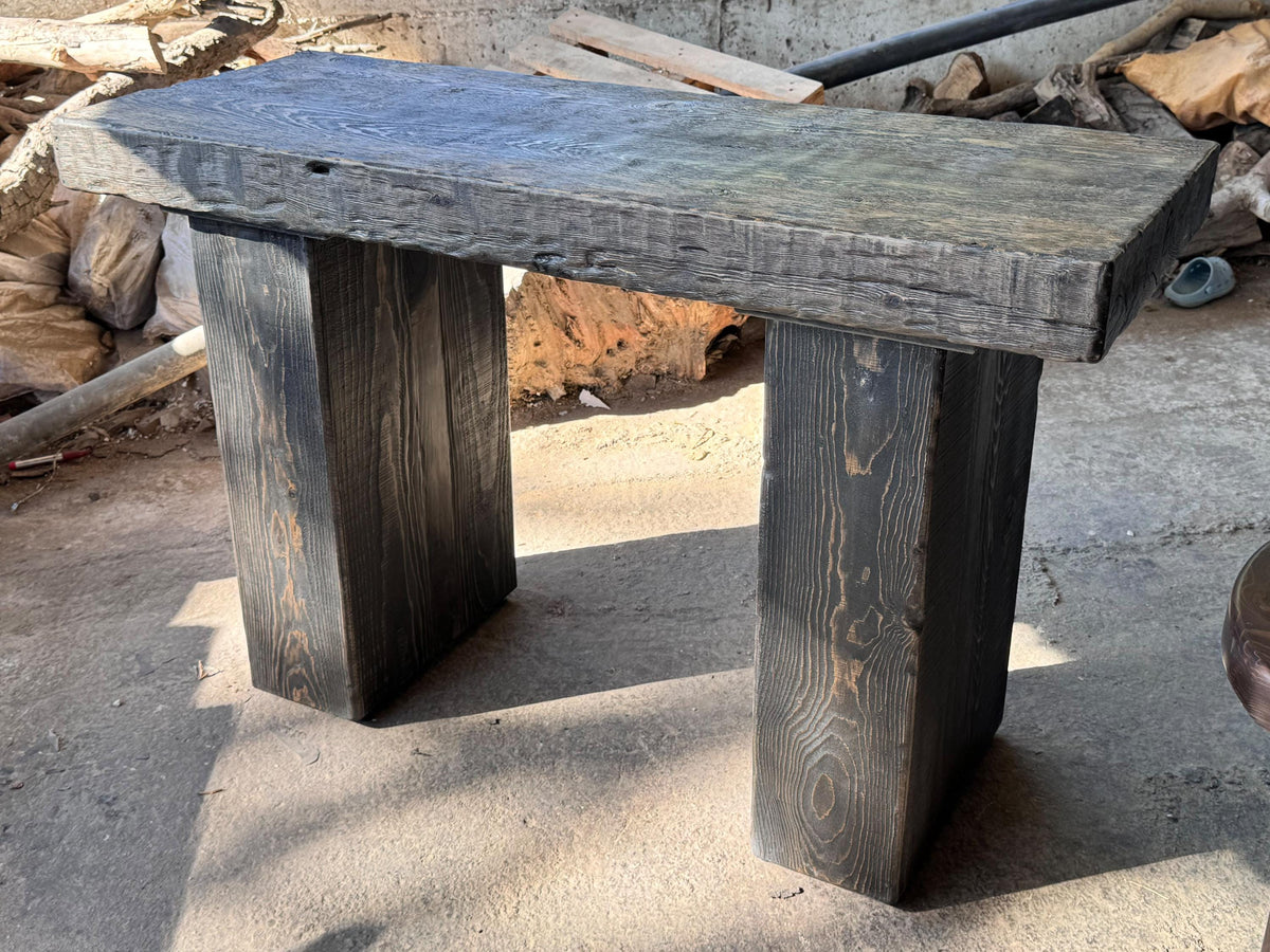Handmade reclaimed wood console table shown full length with a slim top and straight solid wood legs