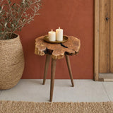 Olive tree table styled in a living room setting