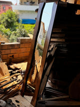 Olive wood mirror in the workshop before finishing
